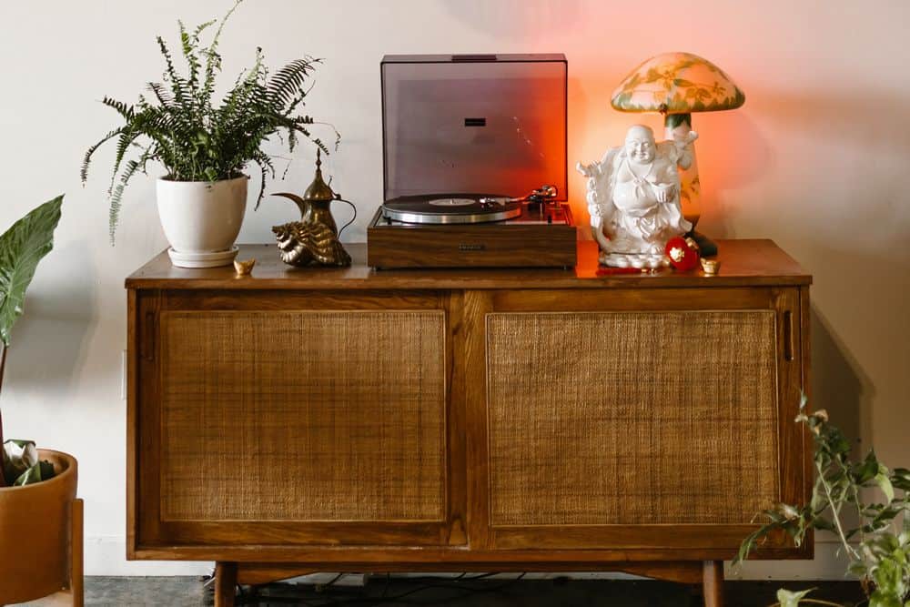 record player on dresser stand